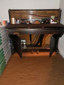 antique piano bar display