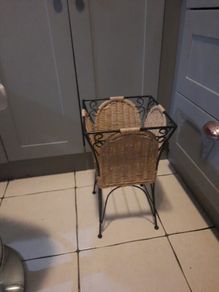large wicker and metal plant holder