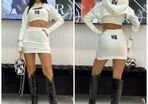 A three-piece set with a skirt
