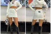 A three-piece set with a skirt