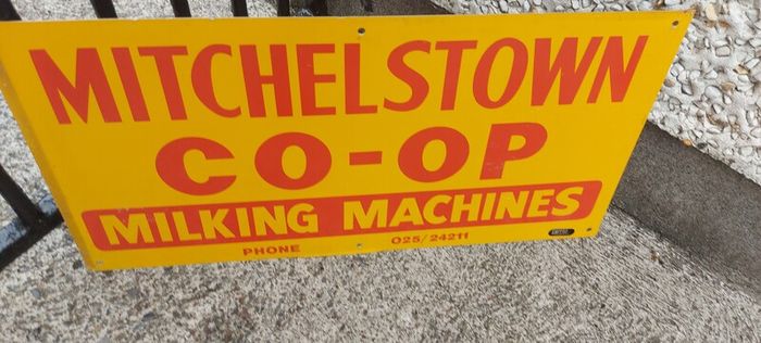 Mitchelstown hay barn advertising,sign by currans of Clonmel,,original ,came out of the offices in mitchelstown branch ,,,few marks  ,lovely advertising display item, for any garage ,man cave or personal collection, sold as is