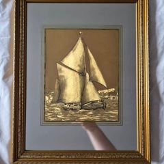 Vintage gold sailboat on mirror picture