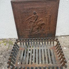 Fire grate with a Cast iron backing