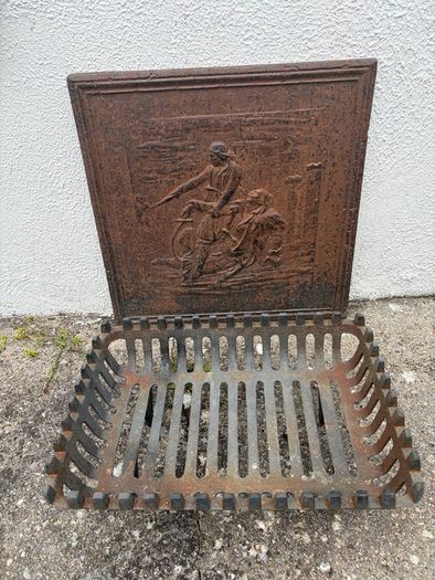 Fire grate with a Cast iron backing