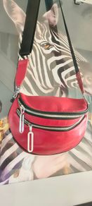 Red crossbody bag, adjustable shoulder strap.