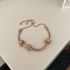 Pandora bracelet in rose gold with charms