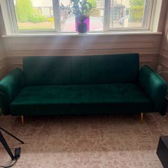 Gorgeous emerald green velvet sofa!