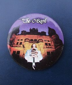 THE O BAND (70's rock group) - a scarce promotional tour badge (1977). Large size 63mm diameter.
