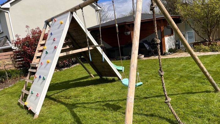 Swing set with slide