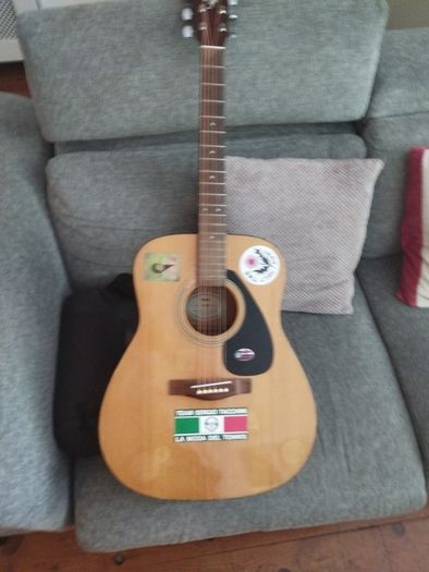 Yamaha acoustic with strap