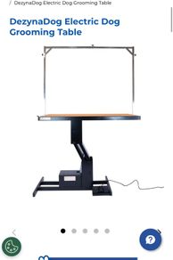 Dog grooming table