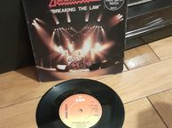 main image for ad Judas PRiest BReaking Tzhe Law uk 7inch 1980