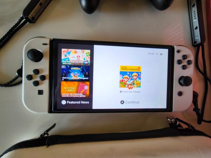 Nintendo Switch OLED White - MINT + Box + Case + 256GB + 2 Games + Warranty 2028