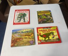 Dinosaur books and two jigsaw dinosaur books