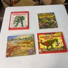 Dinosaur books and two jigsaw dinosaur books