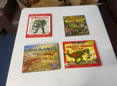 Dinosaur books and two jigsaw dinosaur books