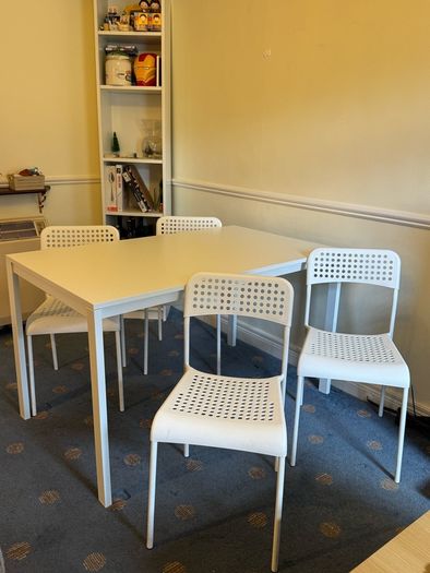 IKEA white dining table and chairs