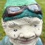 Vintage Reconstuted stone garden gnome on car, hand painted Image 3