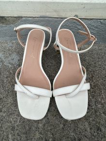 White heeled sandals