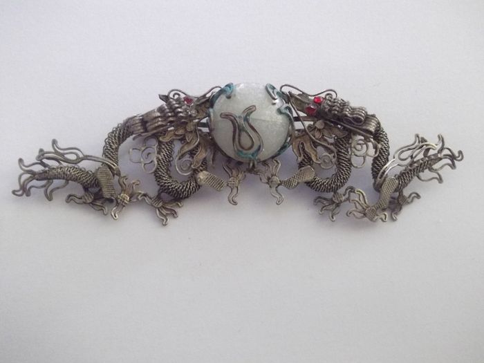 a vintage silver chinese filigree brooch