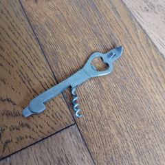 Bottle opener and corkscrew