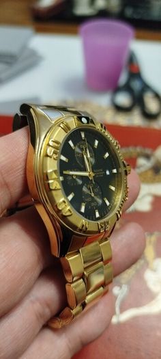 accurist mems gold tone watch