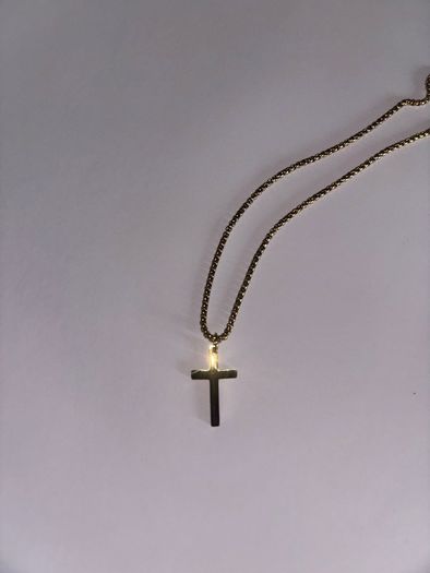 Gold cross.