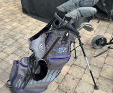 U.S Kids Golf Clubs, includes bag and caddy car