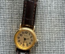 Ladies Q&Q (Citizen) Falcon gold-tone quartz watch, brown leather strap