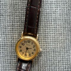Ladies Q&Q (Citizen) Falcon gold-tone quartz watch, brown leather strap