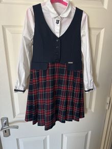 school uniform. Set dress and shirt. 134 cm