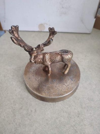 Vintage Brass effect Deer on circle base.
