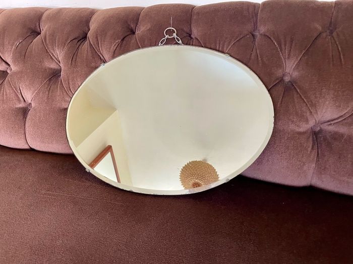 Pretty Early 20th Century Frameless Oval Bevelled Mirror with Original Chain