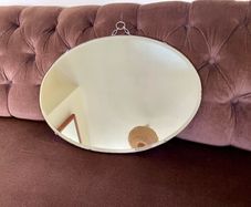 Pretty Early 20th Century Frameless Oval Bevelled Mirror with Original Chain