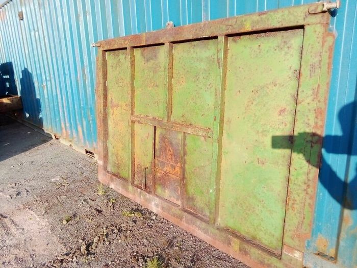 Grain trailer back door