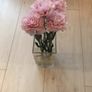 Glass vase and faux carnations Image 2