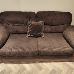 Two seater brown fabric sofa