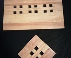 A beautiful set of hardwood tableware, consisting of 4 place mats and 4 matching coasters