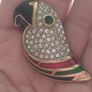 Beautiful vintage parrot brooch covered with rhinestones with enamel accents. Image 7