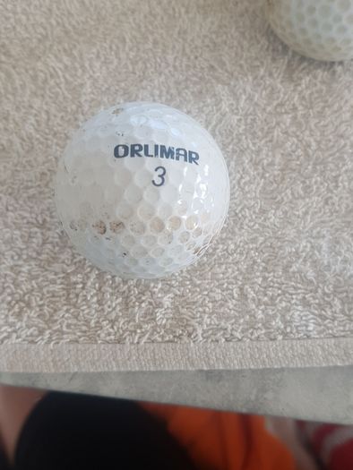 golf ball and tees