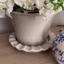 Beige pot with faux flowers Image 3