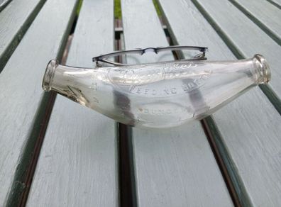 Vintage baby bottle feeder