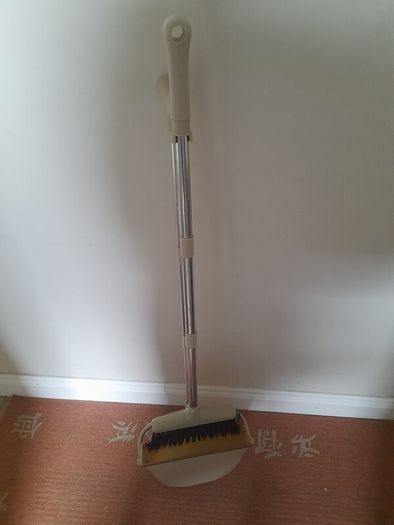 Long handled dustpan and brush.