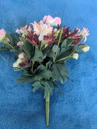 Small artificial bouquet of flowers