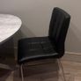 Round marble-effect dining table with 4 black chairs Image 2