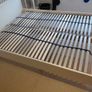 White wooden bed frame with slatted base Image 2