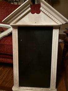 Ornate painted wooden blackboard