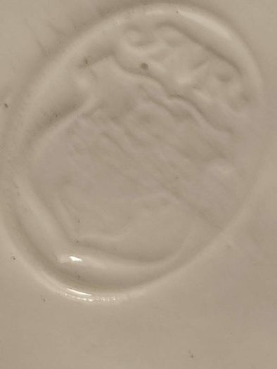 Rare find Cherub  Porcelain Horseshoe as flower vase held with child .