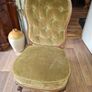 A Victorian Walnut upholstered Nursing Chair c1860 nicely Carved with Cabriole legs. It has Brass Castors. Image 2