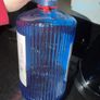 Blue gunpowder gin bottle with cork string lights Image 2